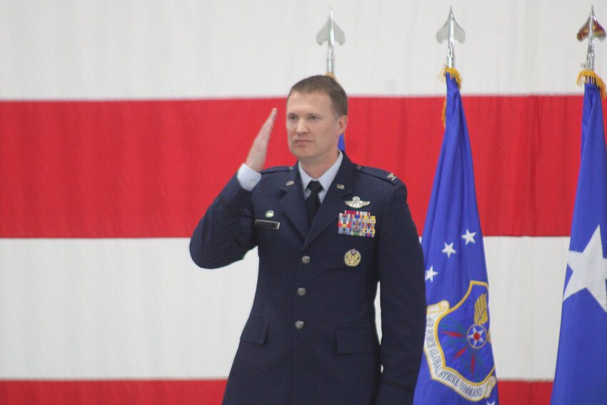 Col. Josh Wiitala salutes after taking control of the 509th Bomb Wing during a ceremony Wednesday, June 18, at Whiteman Air Force Base. .