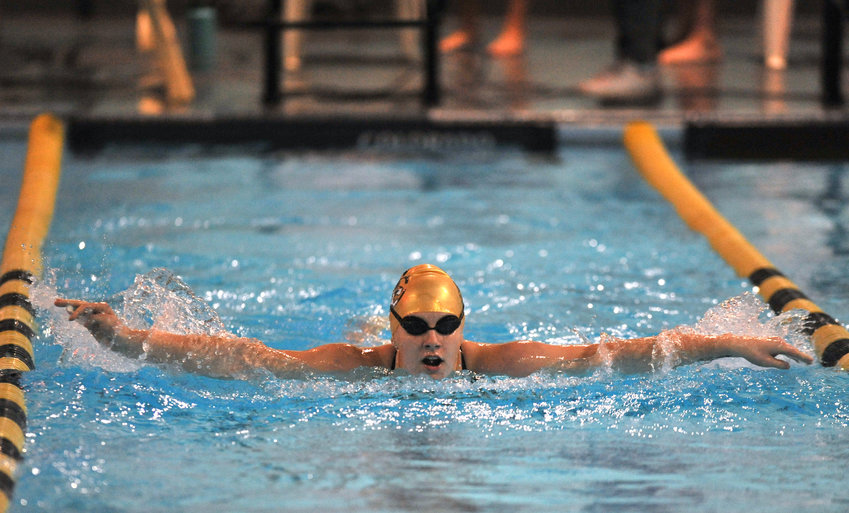 Smith-Cotton sophomore Paris Hammer breathes during the 100-yard butterfly event Tuesday at Joseph W. Arbisi Memorial Pool in Sedalia.