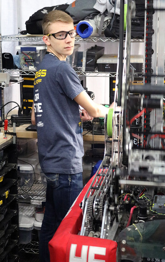 Malacki Ehlers, a member of Team SCREAM, Smith-Cotton High School's competitive robotics team, checks robot functions in the pit during the FIRST Robotics World Championships in Houston in April 2019. Ehlers has been named a candidate in the 2021 U.S. Presidential Scholars Program.