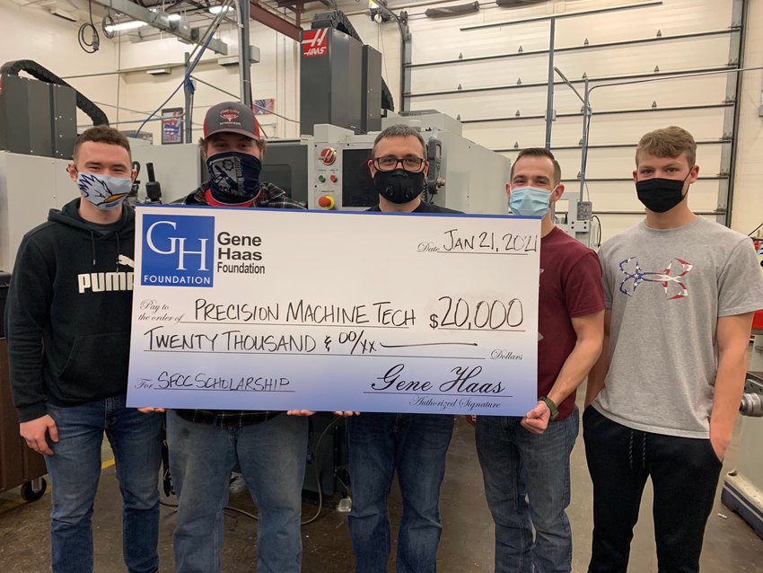 The Gene Haas Foundation recently donated $20,000 to SFCC&rsquo;s Precision Machining Technology program and awarded scholarships to three SFCC students. From left, SFCC students Shae Childers and Laben Twenter, SFCC Precision Machining Technology Program Coordinator Justin Wright, and SFCC students John Kinkaid and Bret Hockett.