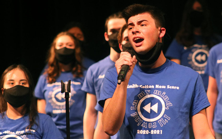 Smith-Cotton High School senior McCade Curry sings his solo during New Score Singers' performance as part of the Show Choir Reveal Concert March 23 in the Heckart Performing Arts Center. Curry has been selected for the Missouri All-State Honor Choir.