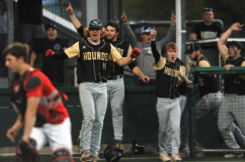 Windsor junior Dalton Witherspoon celebrates as the winning run crosses home plate Thursday during a 10-0 victory over Tipton in the Kaysinger Conference Tournament at Liberty Park Stadium in Sedalia.