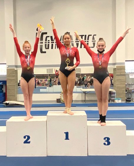From left is Leap of Faith Gymnastics, Cheer and Tumbling LLC&rsquo;s Xcel Gold winners Cassidy Bentch, Jasmine Lopez and Tessa Martin. The trio participated in the 2021 Heart of Missouri State Championships on May 1 in Jefferson City.