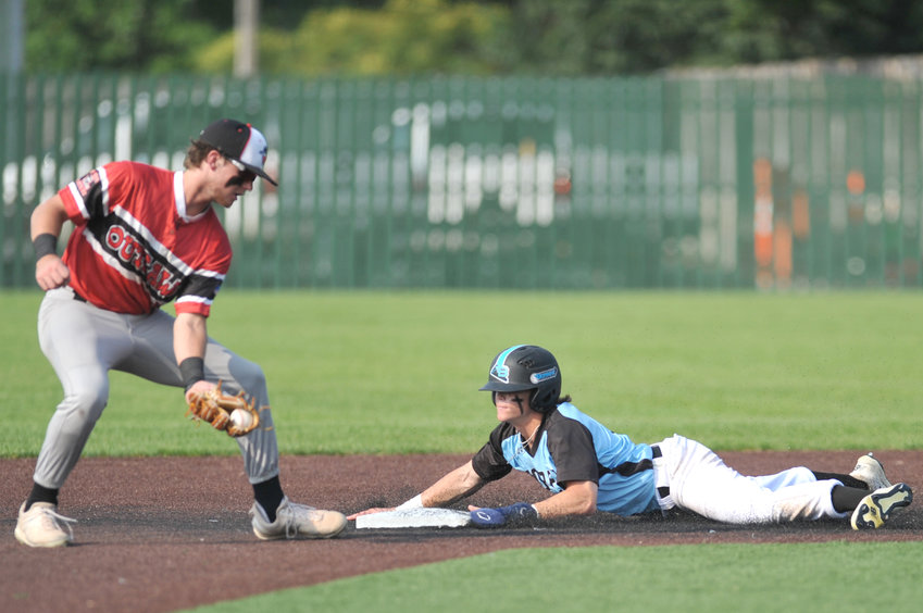 Sedalia Bombers outfielder Gideon Antle slides into second base Wednesday during the first game of a doubleheader against the Joplin Outlaws at Liberty Park Stadium in Sedalia.