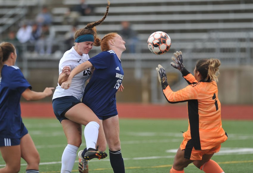 Forward Ally Woolery hits a header past the goalkeeper that was eventually ruled off by officials in State Fair Community College&rsquo;s postseason game Sunday at Tiger Stadium.