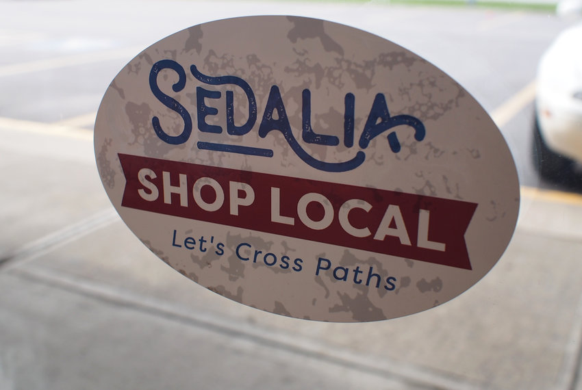 Sedalia Shop Local window stickers encourage visits to local businesses to keep shopping dollars in Sedalia.