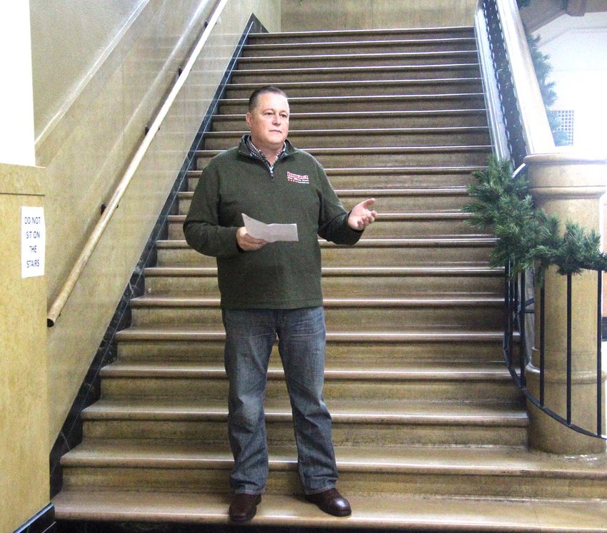 Impact Signs Owner and CEO David Goodson stands on the steps in the Pettis County Courthouse lobby Tuesday afternoon to announce his candidacy for Presiding Commissioner in the 2022 election.