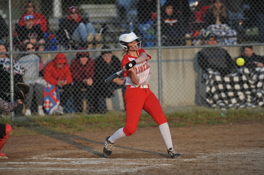 Lincoln's Courtney Stephens swings at a pitch in last year's Kaysinger Conference Softball Championship. Stephens is one of a few returners who will be counted on to keep the Lady Cardinals atop the conference this spring.