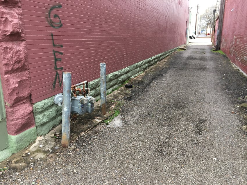 The alley adjoining 209 S. Ohio Ave. is due to receive a makeover this spring when local artist Stefanie Azier-Sattler paints a patriotic mural on the wall donated by Stone Laser Imaging.