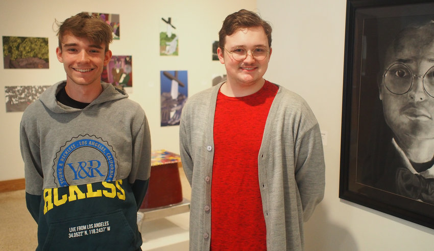 State Fair Community College freshman Logan Shaw and sophomore Cody Strecker, seen Tuesday, each have pieces hanging in the Goddard Gallery of the Daum Museum of Contemporary Art. Both students have worked in virtual reality sculpting as well as more traditional media such as oil painting and charcoal drawing.