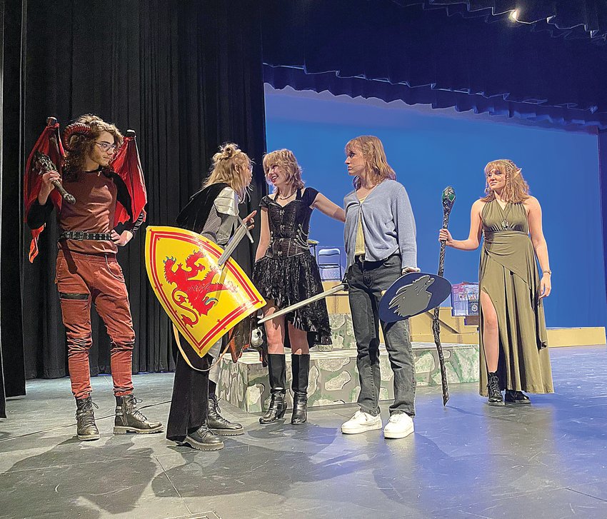 Smith-Cotton High School theatre students, from left, MacAllister Gartner, Chloee Crafton, Lily Ream, Arden Schupp, and Jaiden Clark act in a scene Wednesday night for the upcoming play &ldquo;She Kills Monsters.&rdquo; The play will be performed at 7 p.m. Friday and Saturday in the Heckart Performing Arts Center.