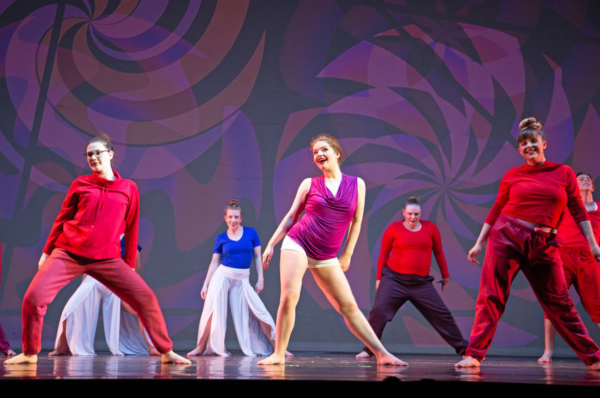 From left, Makenzie Lewis, Addison Rutherford and Janie Turner perform during rehearsal Tuesday evening in the Highlander Theatre in one of the color-themed numbers in &ldquo;Kaleidoscope.&rdquo; University of Central Missouri Theatre and Dance will present the spring dance concert this week.