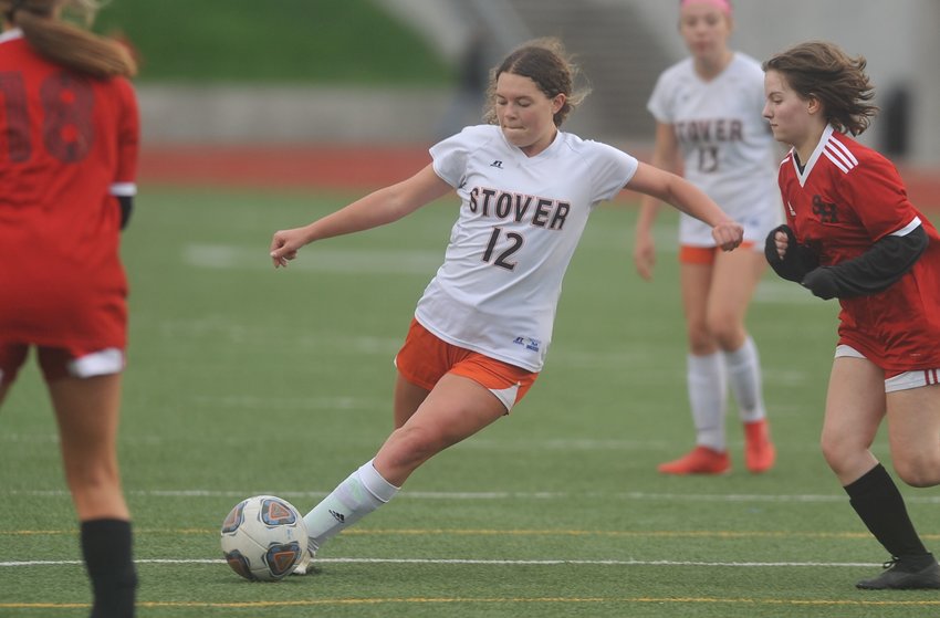 Stover sophomore Hannah Bauer positions herself for a shot in the victory Tuesday over Sacred Heart at Tiger Stadium.