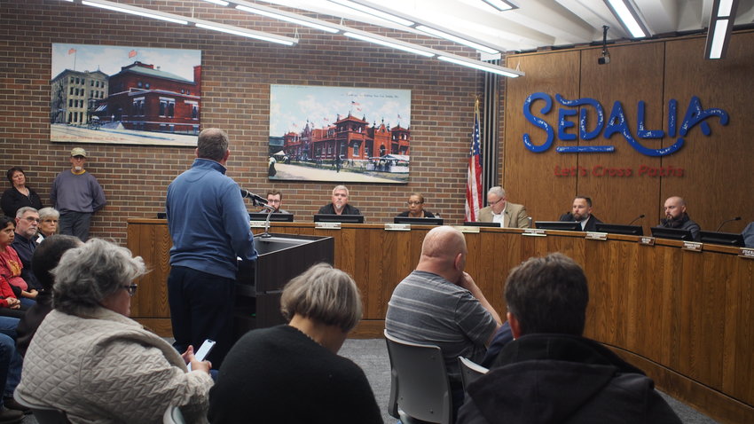Pastor Chad McMullin speaks in favor of services for the homeless at a zoning work session of the Sedalia City Council Wednesday evening.