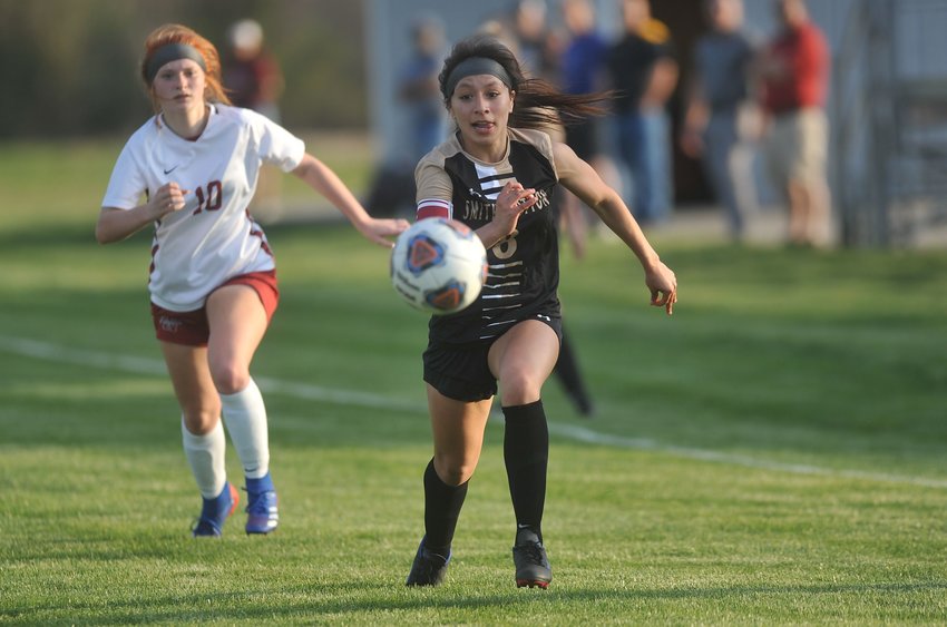 Senior Adamaris Ramirez runs onto a ball played forward in Smith-Cotton&rsquo;s win over Warrensburg on April 12. The two teams will rematch in the opening round of districts this Saturday.