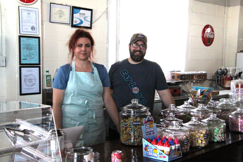 Owner Chris Paszkiewicz stands alongside manager Amanda Gaspard at Cow Bird Creamery and Sweets on Wednesday afternoon. Paszkiewicz, who is Ivory Grille's executive chef, owns the new sweets store along with his wife, Lynn.