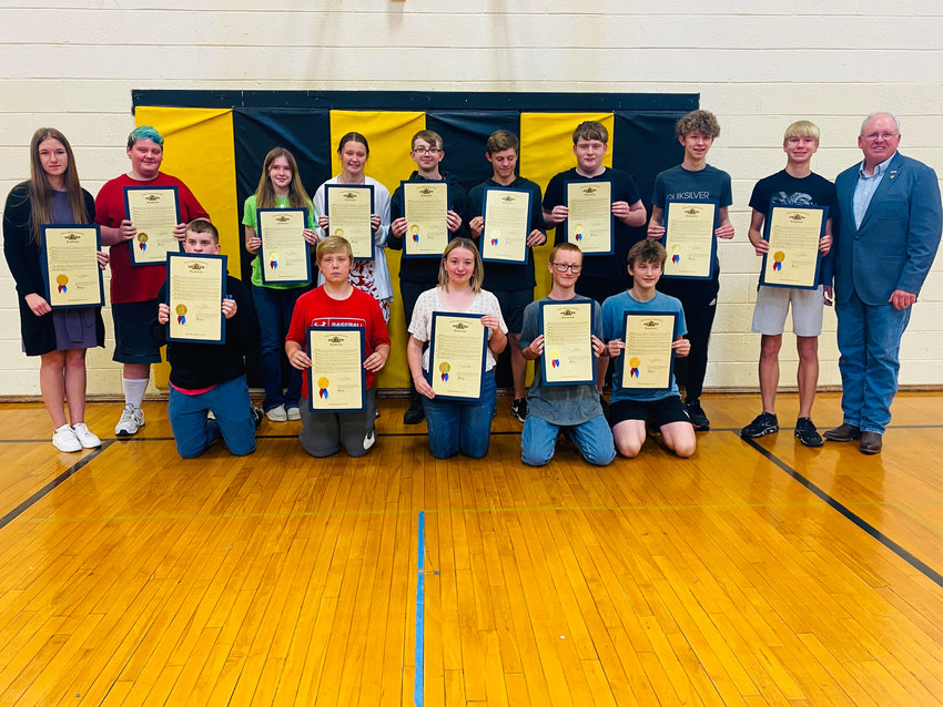 All the Glory Award recipients at Smithton School stand together after being given their resolution with state Rep. Tim Taylor, R-Bunceton.