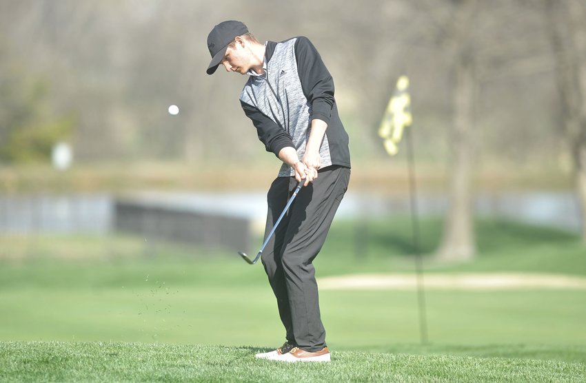 Tigers golfer Boyd Callis chips a shot at Sedalia Country Club Monday afternoon following a medal-winning score of 77 at the S-C Classic.