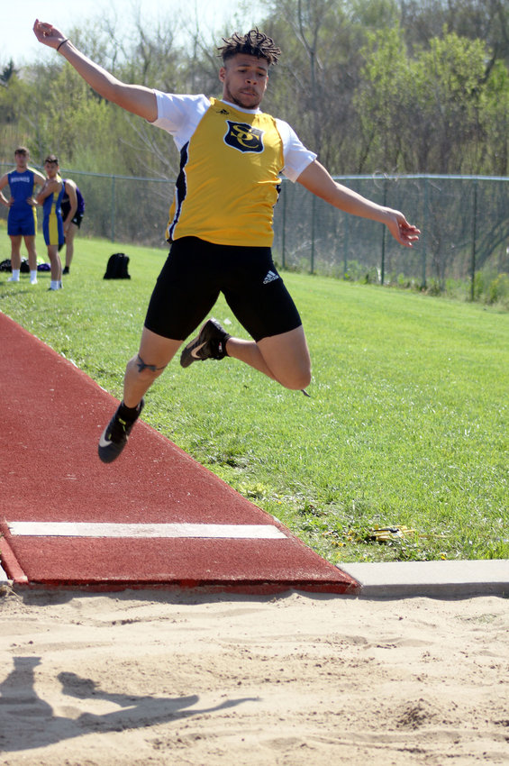Smith-Cotton senior Jaren Washington competes in the long jump in the S-C Tiger Invitational meet April 26 at Tiger Stadium.