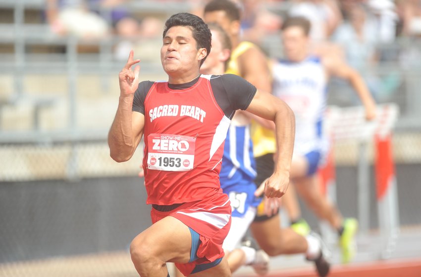 Sacred Heart senior Bruno Saucedo outruns many of his competitors in a heat qualifier Friday. Saucedo took second in both the Class 1 100 and 200-meter finals on Saturday.