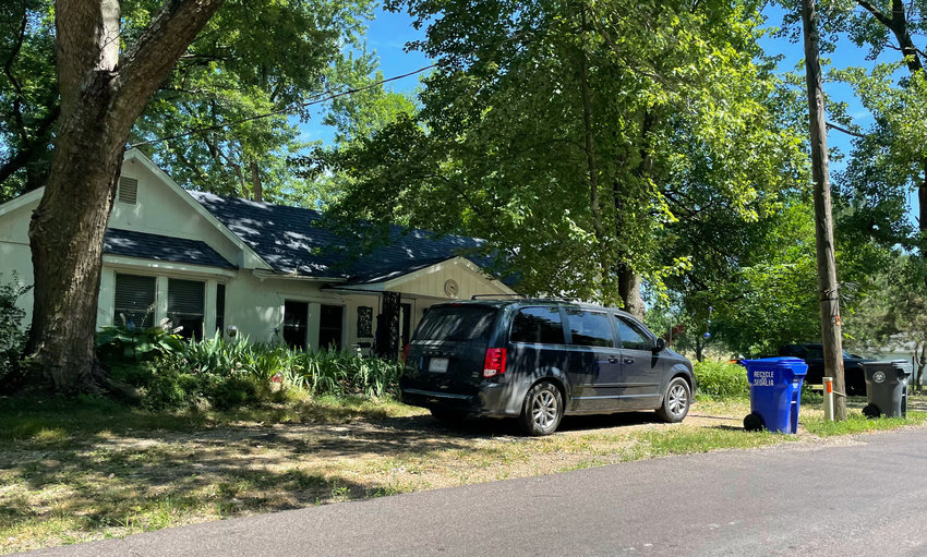 Parking on an unimproved surface, like this front yard on North Grand Avenue seen Monday, may get residents a warning and then a ticket after the illegal parking sweep begins July 7.