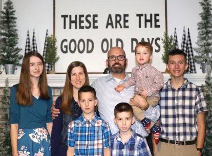 The new Pastor at Hopewell Baptist Church, Adam Porter, stands with his family, from left, daughter Heidi, 14, wife Trina, and sons Isaac, 10, Juda, 7, Solomon, 2, and Xander, 17. Porter, who became pastor at the church about a month ago, noted the congregation is supportive and full of love.