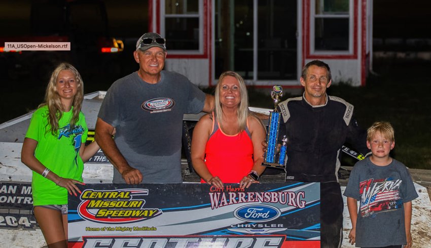 Terry Schultz (second from right) drove to his 74th career CMS win on Saturday in B-Mod action.