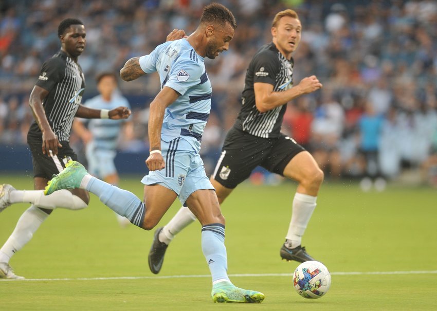 Sporting Kansas City forward Khiry Shelton assists Daniel Salloi on the first of six goals in the club&rsquo;s shutout victory Wednesday over Union Omaha at Children&rsquo;s Mercy Park in the quarterfinals of the 2022 U.S. Open Cup.