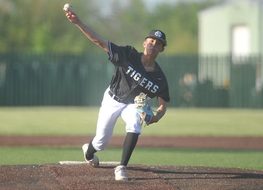 Smith-Cotton&rsquo;s Jakobe Linn deals a pitch in Thursday&rsquo;s game against Helias at Liberty Park Stadium. The Tigers open the postseason against Rock Bridge on May 16.