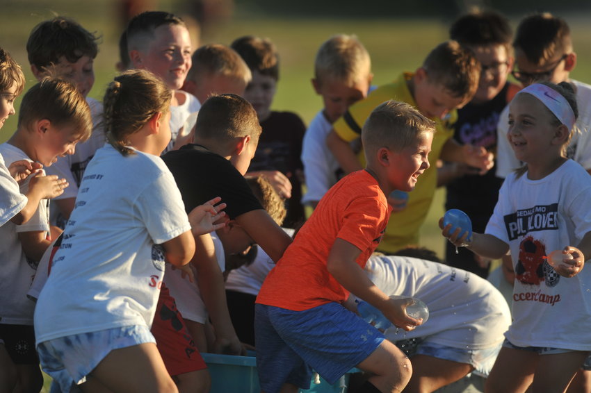 Participants from this year&rsquo;s Paul Klover Soccer Association Revolution FC Camp cool off in the form of fun with water balloons at the conclusion of Thursday&rsquo;s final session at Clover Dell Park.