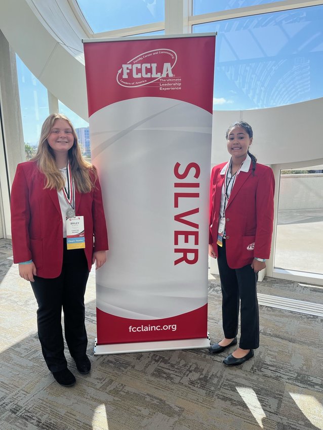 Knob Noster Middle School FCCLA members Briley Burden, left, and Gaby Quinones receive a Silver Rating at the 2022 National Leadership Conference on June 29 through July 3 at the San Diego Convention Center.