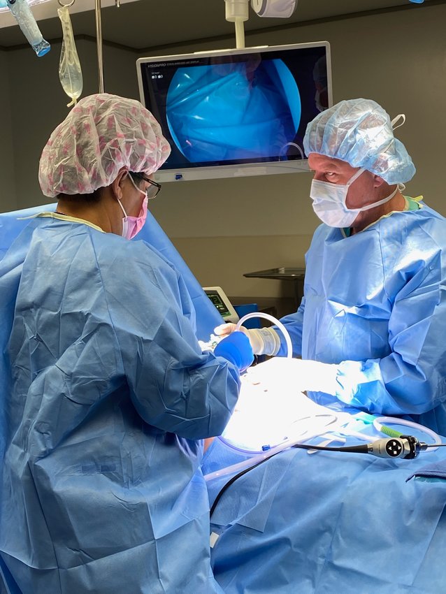 Dr. Stuart Braverman, right, performs surgery recently at Bothwell Regional Health Center with Cheri Gorrell, scrub nurse. Medical students are often able to assume the role of &ldquo;first assistant&rdquo; working across from surgeons, where they learn by helping select equipment, hold open incisions, stop bleeding or close incisions.