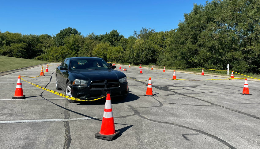 Sedalia Police officers get Emergency Vehicle Operators Course (EVOC) training Tuesday at Clover Dell Park. The Dodge Challenger and Ford Taurus were both tested on a closed course.