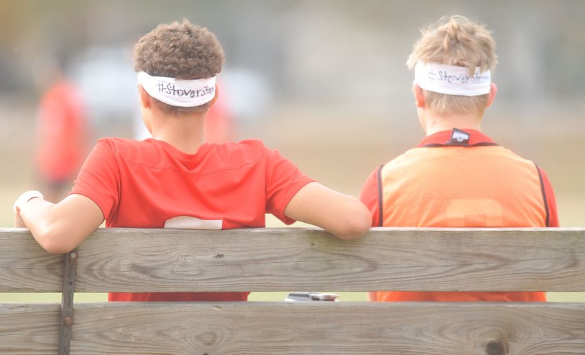 Laquey players wear &ldquo;#StoverStrong&rdquo; headbands on the bench during the Hornets&rsquo; match with the Bulldogs in Saturday&rsquo;s Stover Classic semifinal.