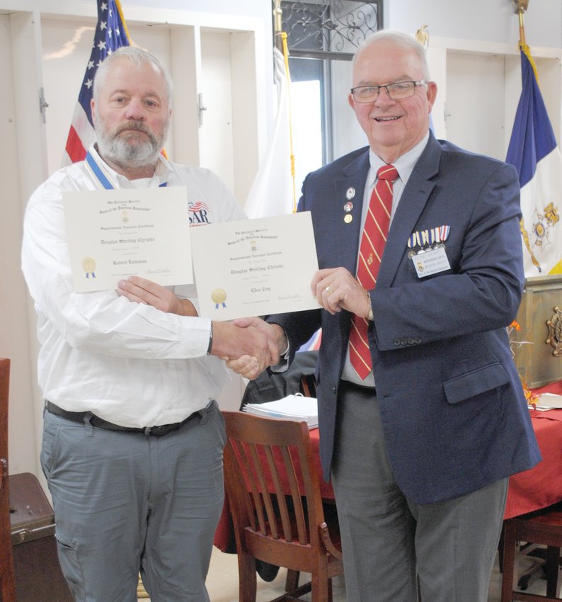 From left, Doug Christie, president of the Martin Warren Chapter, MOSSAR, stands with Gene Henry, 1st vice president of the Missouri Society, Sons of the American Revolution.