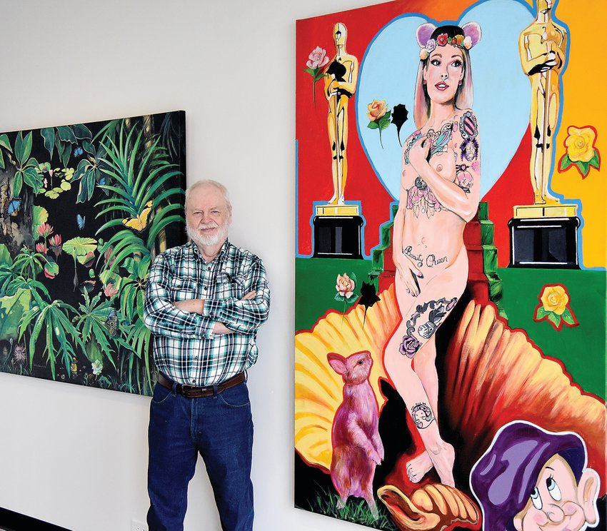 Warrensburg artist Gary Cadwallader stands with two of his paintings, &quot;Blue Morpho,&quot; left, and &quot;The Birth of Venus.&rdquo; Cadwallader has a new two-room exhibit at the Hayden Liberty Center. The Liberty Center will host an artist reception for him from 5 to 7 p.m. Thursday.