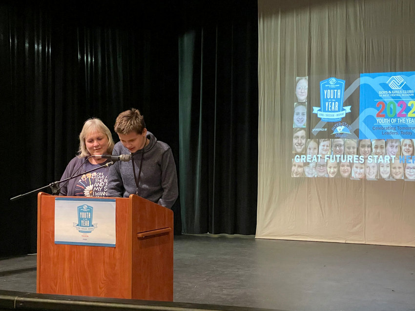 With support by his side, 14-year-old Bryce from the Dresden Site presents his speech for the Youth of the Year teen category during the Boys &amp;amp; Girls Clubs of West Central Missouri&rsquo;s annual event in 2022.   Photo courtesy of Boys &amp;amp; Girls Clubs of West Central Missouri