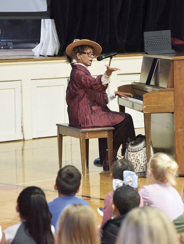 Musician Dr. Joyce Richardson, of New Jersey, talks to students at Horace Mann Elementary Monday morning. Richardson will visit area schools this week as the Scott Joplin International Ragtime Foundation artist-in-residence.