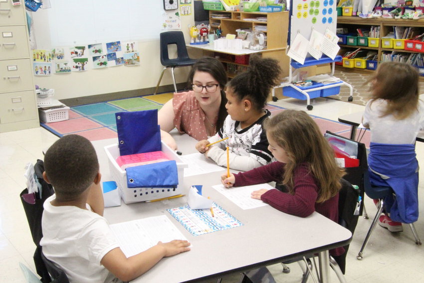Parkview Elementary first grade teacher Megan Palmer helps her class during reading and writing time Thursday morning, Feb. 23. Palmer was named the district-wide Outstanding Educator 2022-23 for on Tuesday, Feb. 21 by the Sedalia Community Educators Association.&nbsp;