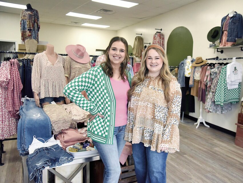 Taylor Austin, left, of Hughesville, and Dylana Fox, of Cole Camp, owners of Show-Me Trends Collective Boutique, welcome customers during the shop's grand opening Friday morning, March 10. The Boutique is located at 110-A W. Third St. in downtown Sedalia.