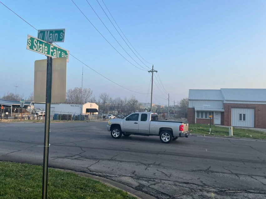 This intersection at West Main Street and South State Fair Boulevard will hopefully become a roundabout if the City and County can agree on the terms of the sale of the former County Highway Department Building, 2208 W. Main St. The price of $280,000 has been agreed upon, but other conditions may sour the deal.   Photo by Chris Howell | Democrat