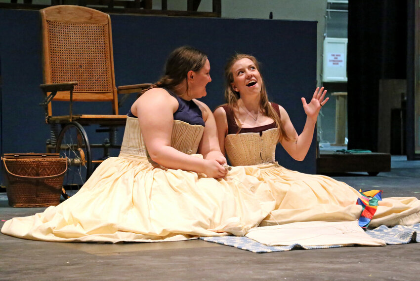 Jo March (Alannah Trigg), left, smiles at her younger sister Beth (Rachel Curry) as the pair sings &ldquo;Some Things Are Meant To Be&rdquo; during a rehearsal of &ldquo;Little Women: The Musical&rdquo; on Thursday, March 31 at the Highlander Theatre at the University of Central Missouri. The musical will be performed April 6-9.   Photo by Nicole Cooke | Warrensburg Star-Journal