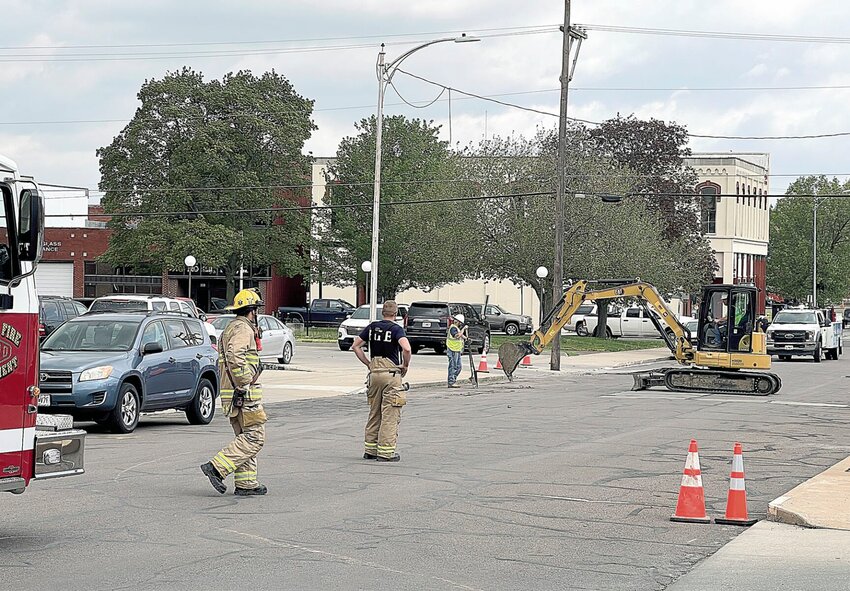 Thursday, April 20, a natural gas leak caused the evacuation of portions of downtown Sedalia including City Hall. The Sedalia Fire Department and Liberty Utilities responded to the leak, which was caused by digging by fiberoptic crews. Around 11 a.m., the smell of gas was noticeable as well as the sight of fumes emanating from a breach in the asphalt on South Osage Avenue. The Pettis County Sheriff's Office issued an all clear for the leak via Nixle alert at 12:33 p.m.   Photo by Faith Bemiss | Democrat