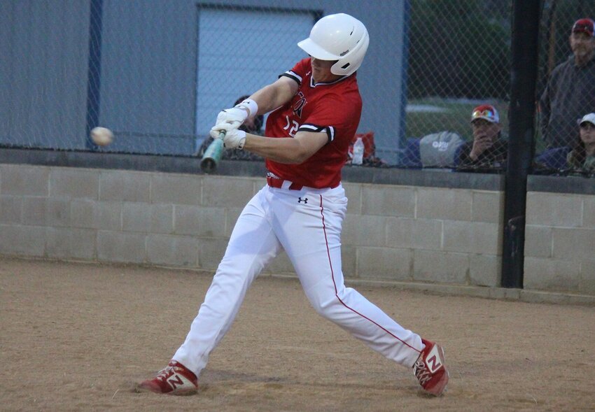 Cardinals infielder Sam Duke makes contact in Monday evening&rsquo;s Kaysinger Conference Tournament semifinal victory over Sacred Heart. Duke finished 2-5 at the plate with four RBIs.   PhotoCredit: Photo by Bryan Everson | Democrat