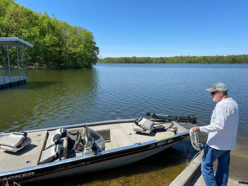 Gary Burton, of Sedalia, puts his bass boat in at Spring Fork Lake Wednesday, May 3. The lake was under contract to be sold, but the deal recently fell through and now the city is seeking public comments to determine the lake's future.   Photo by Chris Howell | Democrat