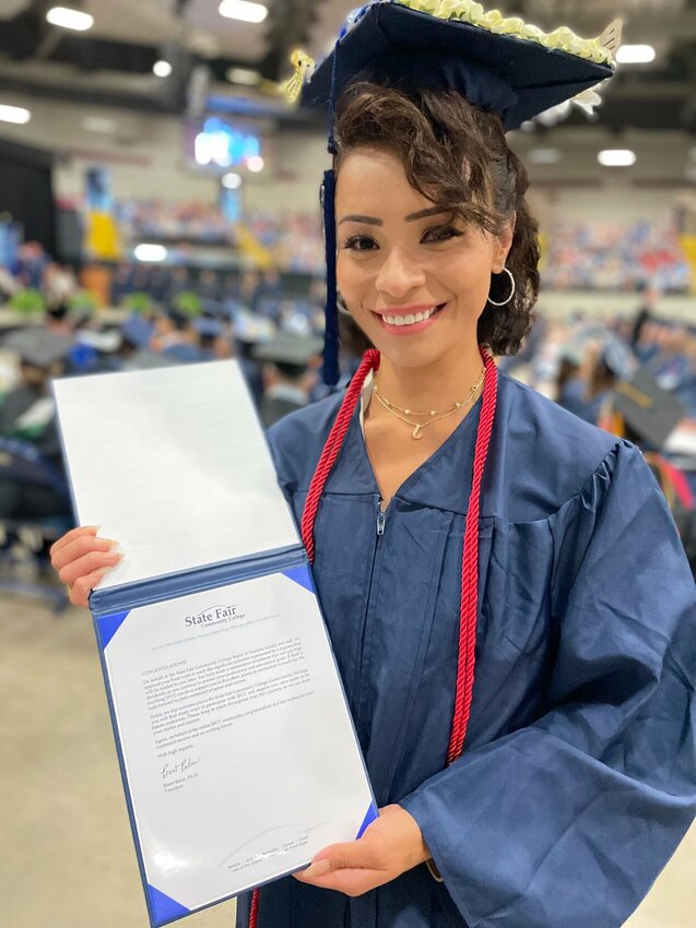 Jacqueline Aliasbeth Linares-Montejo holds a State Fair Community College diploma she said she worked years to achieve. She credits her children, Jordan and Jeremiah, as her inspiration.&nbsp;   Photo by Chris Howell | Democrat