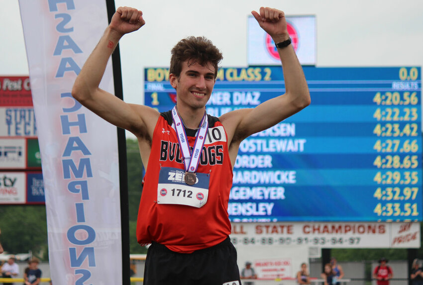 Stover senior Blaine Brodersen celebrates after taking third place in Friday's Class 2 1,600-meter run. Brodersen finished second in the 800-meter run and has a chance to medal again when he participates in the two-mile event Saturday.   PhotoCredit: Photo by Bryan Everson | Democrat