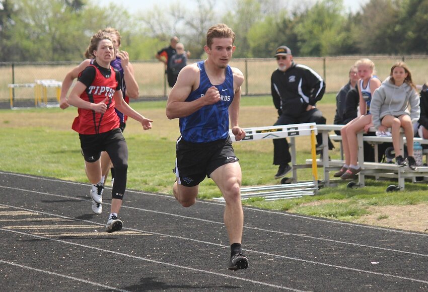 Cole Camp's Reid Harrison wins the 200-meter dash event at Wednesday's Kaysinger Conference track meet in Smithton.   PhotoCredit: Photo by Bryan Everson | Democrat