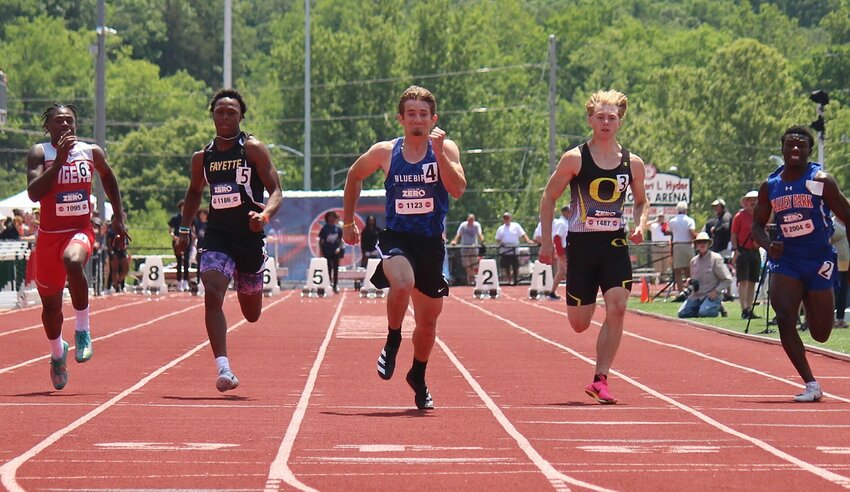 Cole Camp junior Reid Harrison (middle) wins the Class 2 100-meter dash Saturday afternoon at Adkins Stadium in Jefferson City.&nbsp;   PhotoCredit: Photo by Bryan Everson | Democrat