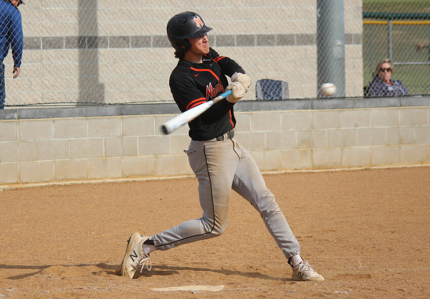 Northwest senior Gavin Killion makes contact with a pitch in the Kaysinger Conference Baseball Tournament semifinals on April 24, 2023. The Mustangs appear headed for another collision with Leeton, a rematch of last year's district title game.   PhotoCredit: File photo by Bryan Everson | Democrat